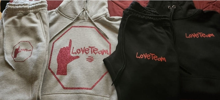 Gray Love Team Sweatsuit an Black Love Team Drip Sweatsuit